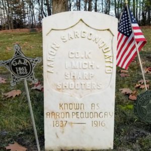Gravestone Aaron Pequongay at Hillcrest Cemetery in Omena, Michigan.