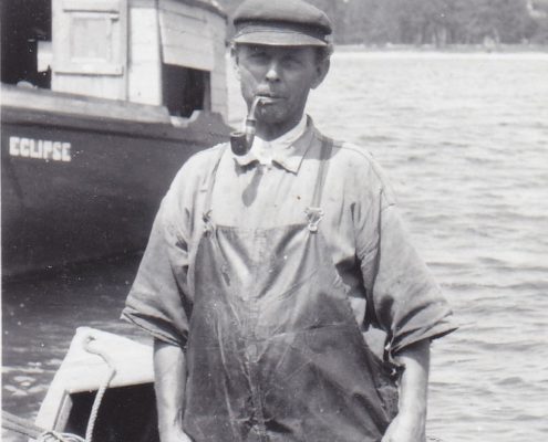 William Schram and his fishing boat the Eclipse